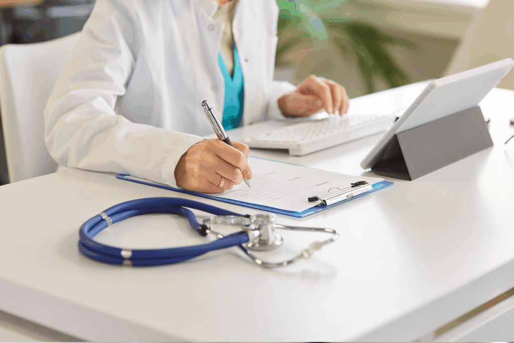 doctor writing a medical report